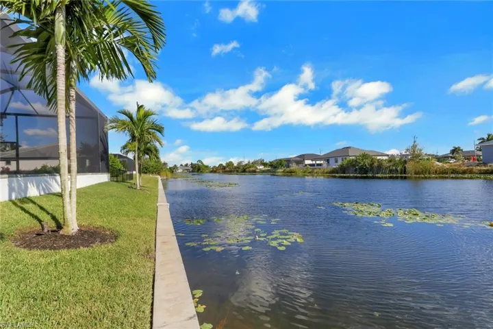 Water view with nearby suburban area