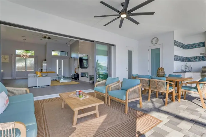 Living area featuring a ceiling fan
