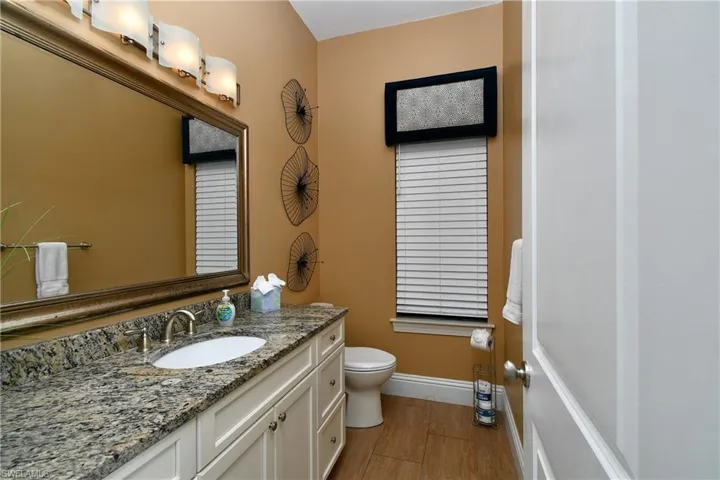 Staircase featuring baseboards