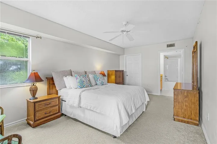 Light-toned wall paint and carpeting throughout