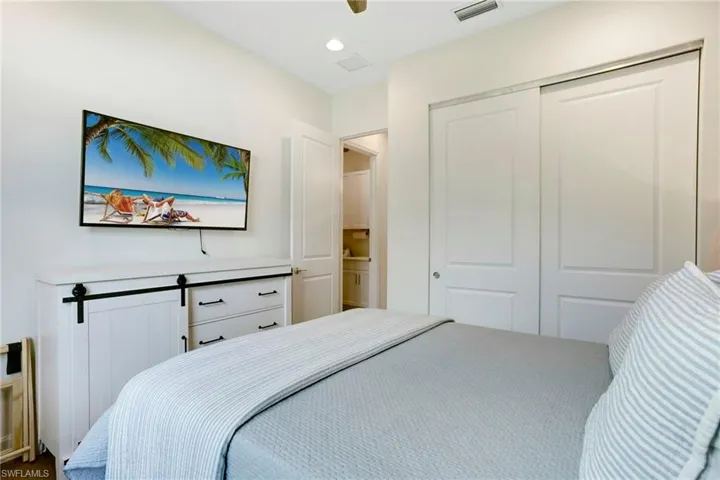 Bedroom featuring a closet and ceiling fan
