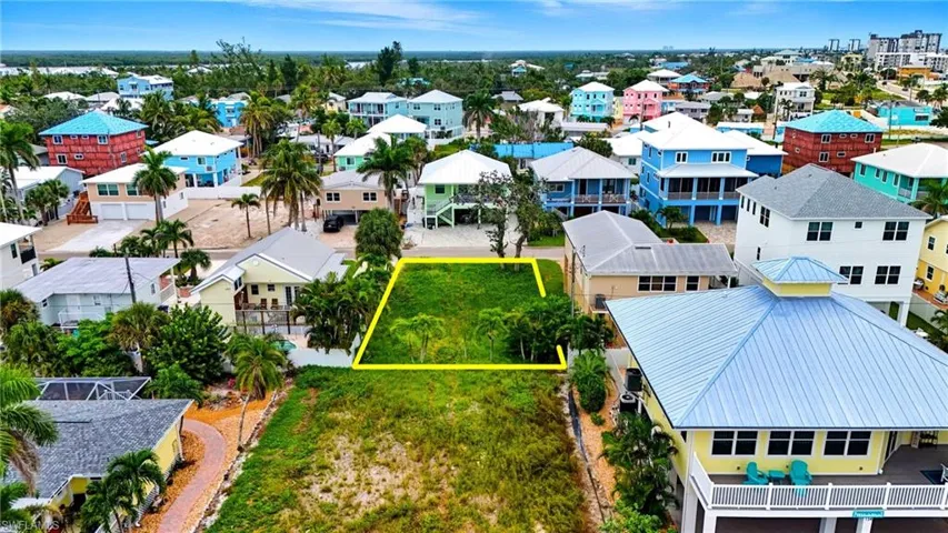 Aerial view of property and surrounding area with property boundaries highlighted - Virtually Edited Image