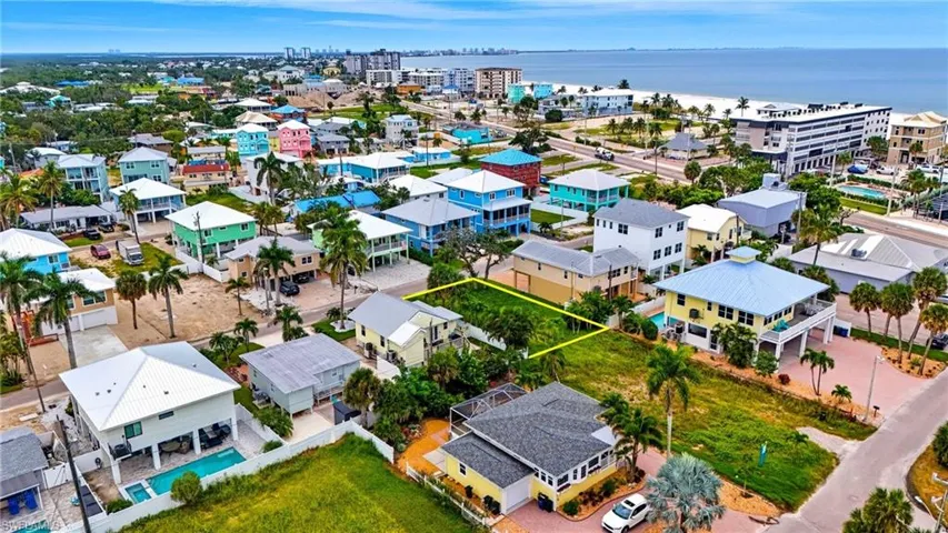 View of urban area featuring a large body of water - Virtually Edited Image