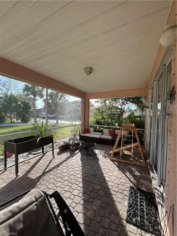 View of patio / terrace with an outdoor living space with a fire pit
