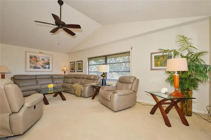 LIVING ROOM WITH CATHEDRAL CEILING