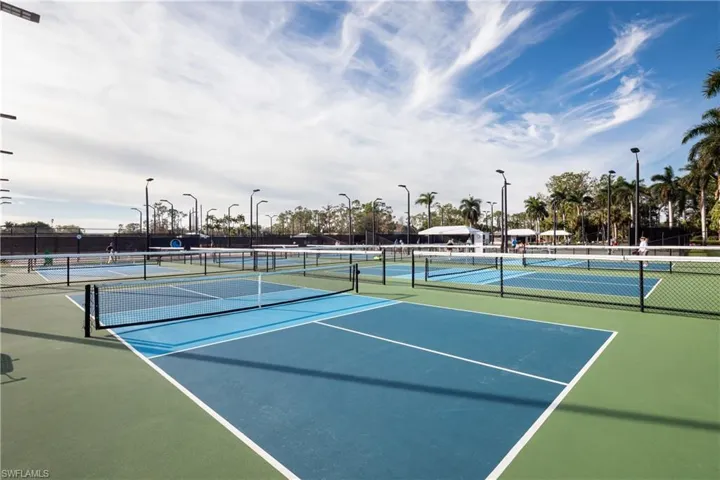 View of sport court featuring basketball hoop