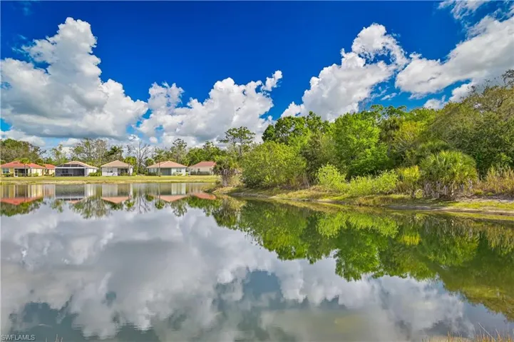 Water view with nearby suburban area