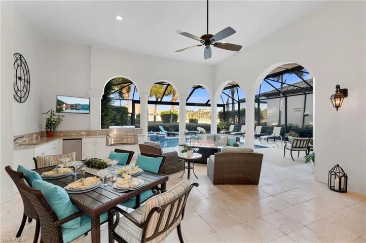 Al fresco dining never looked this good, with a completely redone outdoor Summer kitchen, lanai decking and pool.