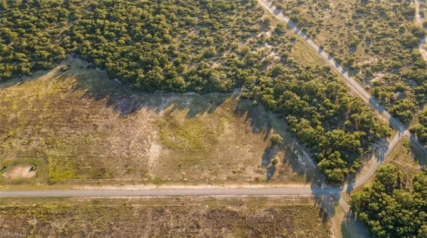 Aerial perspective showcasing a parcel of land