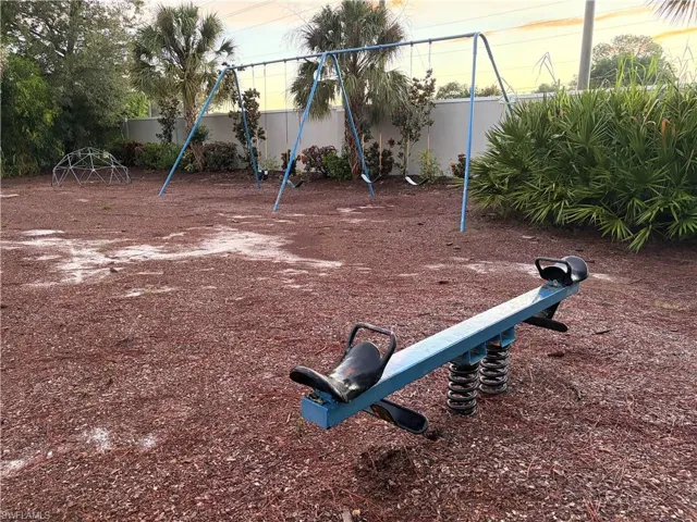 Kids Play ground in the park next to the pool.