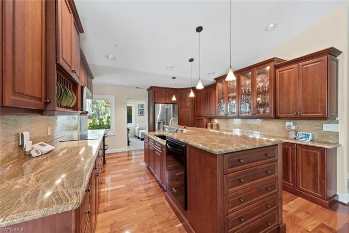 Abundance of cabinetry with stainless steel appliances