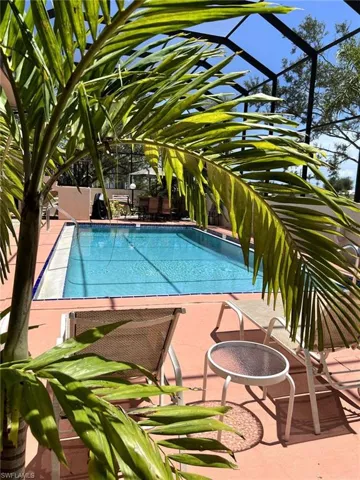 Community pool featuring a patio area and a lanai