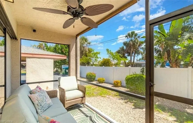Sunroom with ceiling fan and plenty of natural light