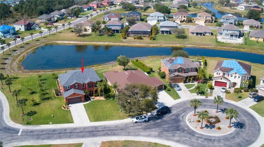 This spacious waterfront pool home is on a quiet cul-de-sac.