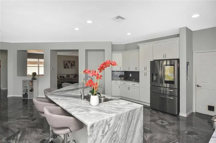 Gorgeous "waterfall" marble countertops...