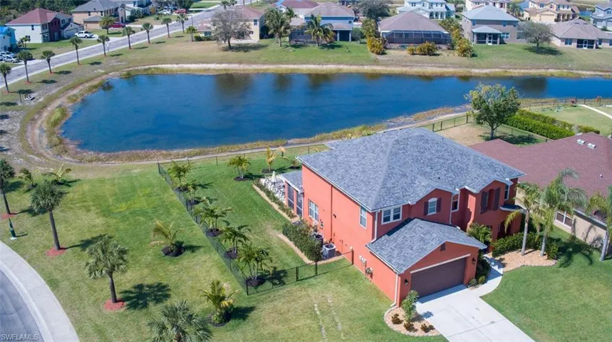 Beautiful home, new pool, new fence, new landscaping, and a lake view...