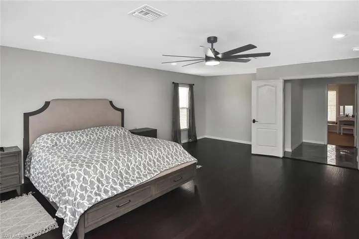 Double-door entry and rich wood flooring...