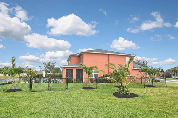 A huge yard with plenty of room for outdoor activity.
