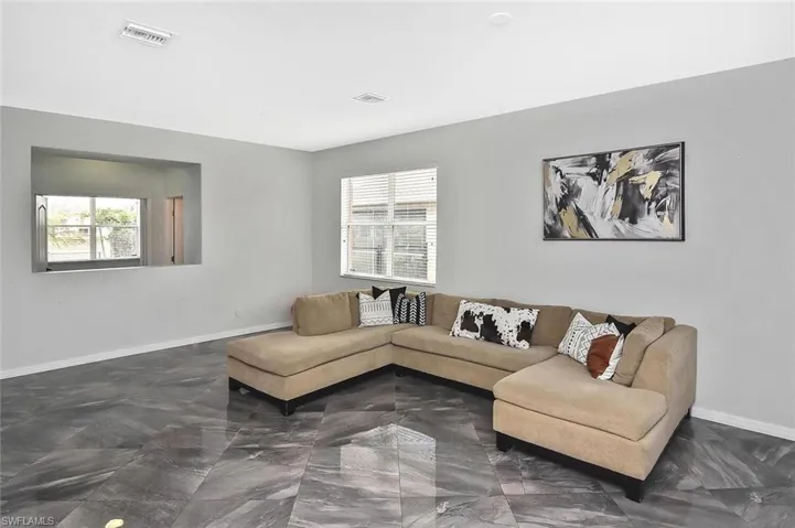 Enter the spacious and airy living room...