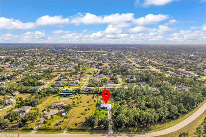View of property location featuring nearby suburban area