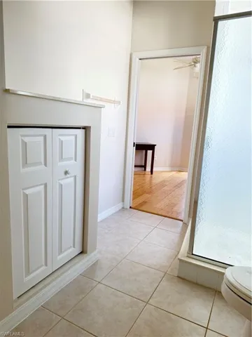 Guest bath with access to the flex room with sliders to pool