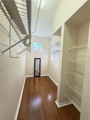 Primary bedroom large walk in closet
