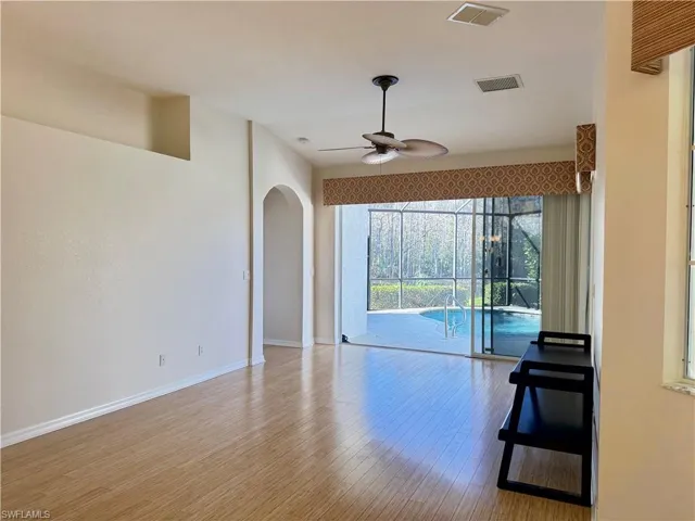 Family room with a gorgeous view of the preserve and walk out to pool