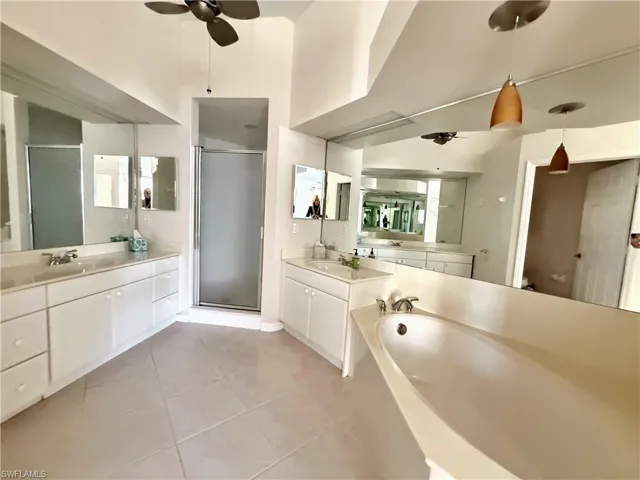 Primary ensuite with dual sinks, soaking tub and large walk in shower