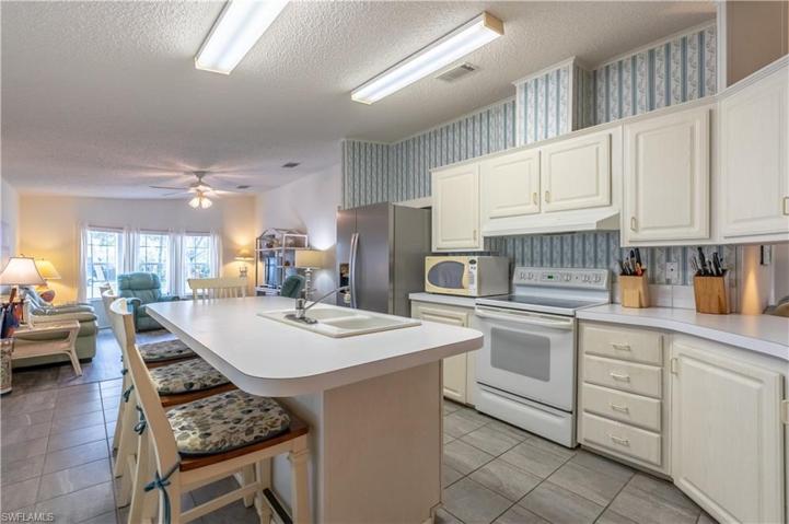 View of Kitchen and Family Room from Dining Room