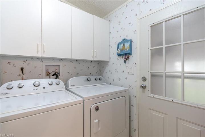 Laundry Room and view of Lanai entry door