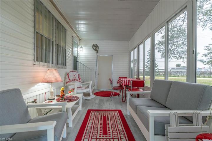 Lanai with view of workshop entry door