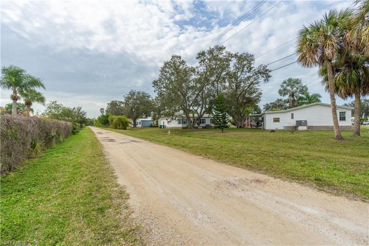Back of home view from quiet roadway