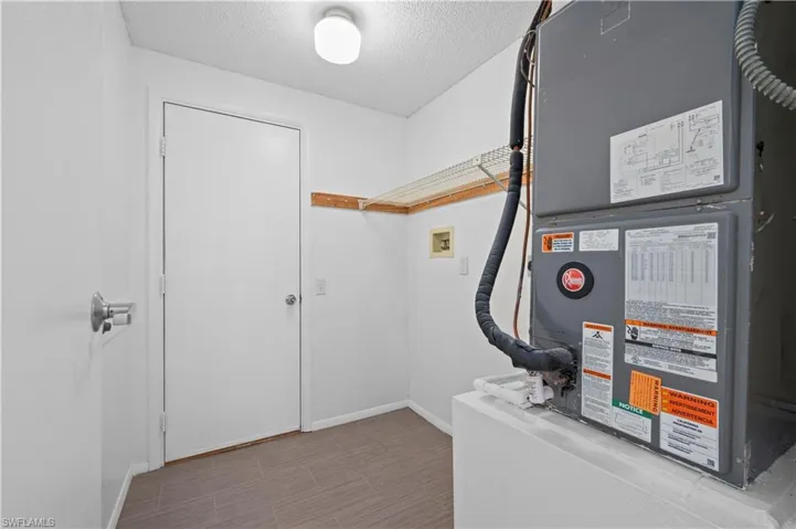 Utility room featuring heating utilities, New HVAC
