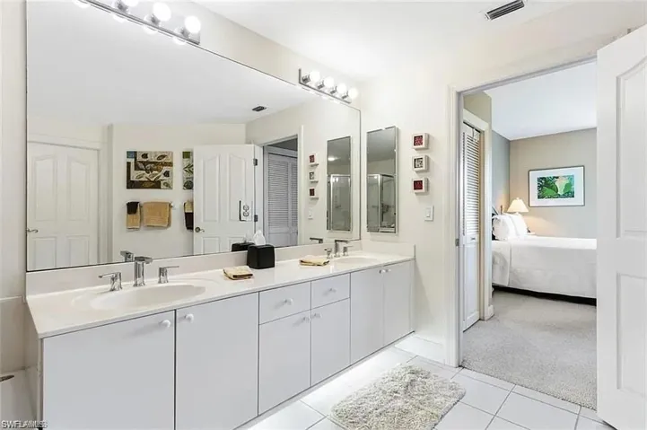 Bathroom featuring vanity and tile patterned floors