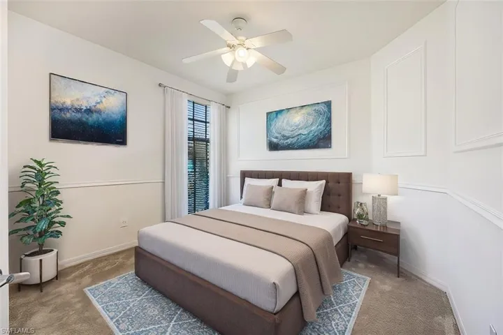 AI Staged - 3rd Bedroom with carpet, ceiling fan, and baseboards