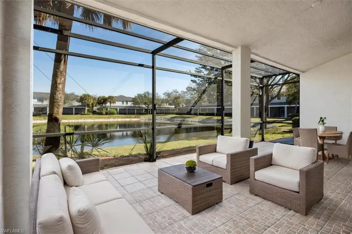 AI Staged - Lanai featuring a water view