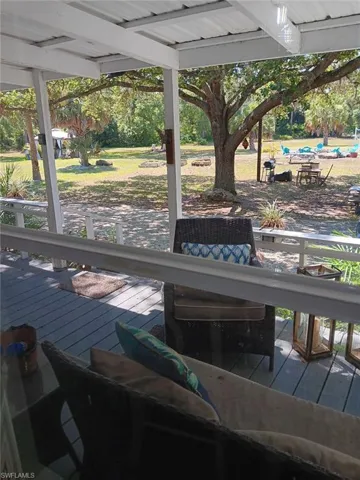 Sunroom with beam ceiling