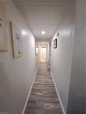Hall featuring hardwood / wood-style flooring