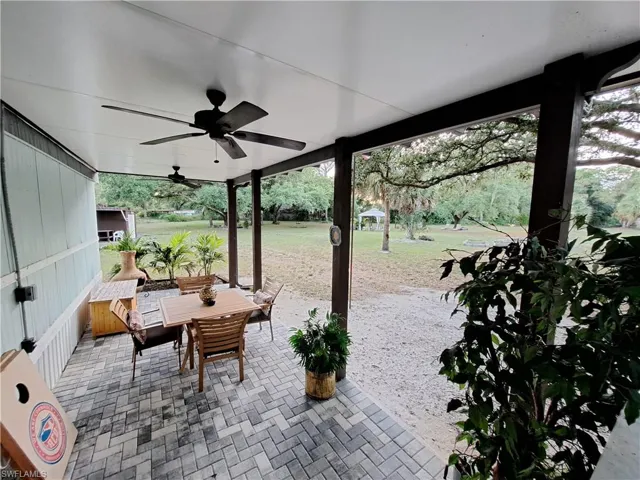 View of patio / terrace with ceiling fan