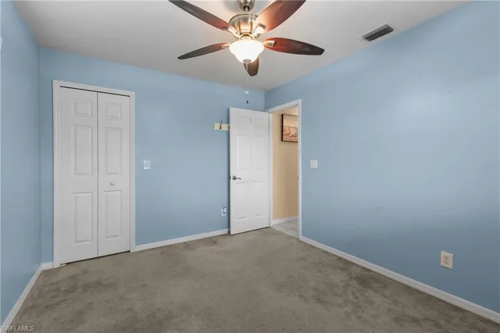 Guest room with walk-in closet