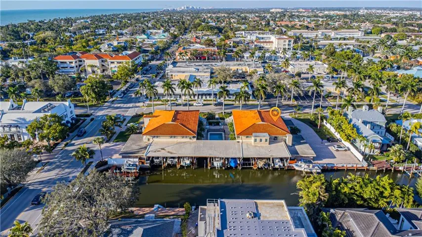 Aerial view with a water view and a residential view
