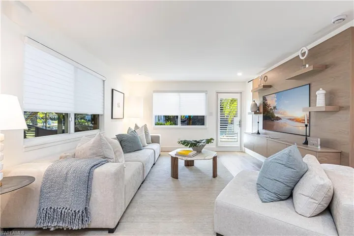 Living area with light wood-style floors