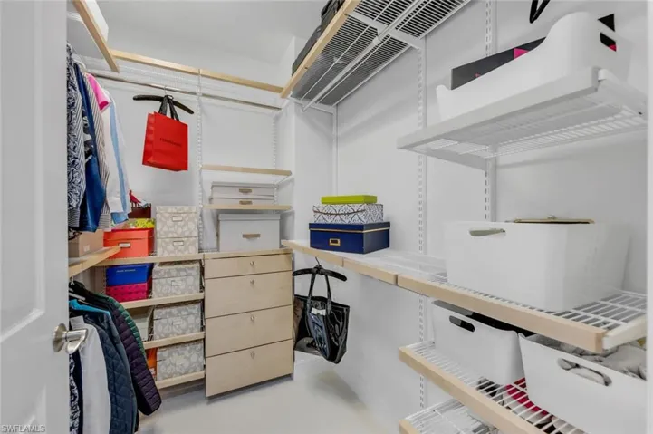 Larger of 2 Custom Primary Closets