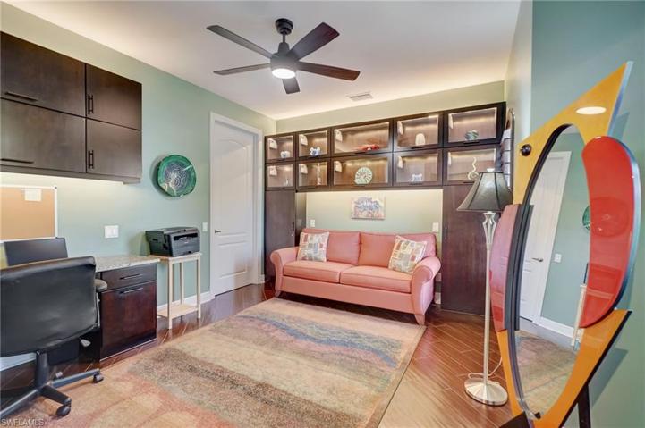Den/Office with Beautiful Built In Display Case