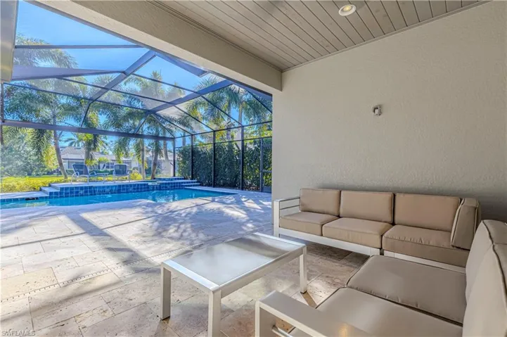 View of patio featuring an outdoor hangout area and a lanai