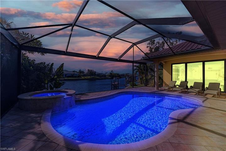 heated pool, spa & clearview lanai at sunset