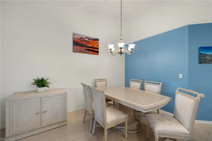 Dining room and living room open to kitchen and lanai