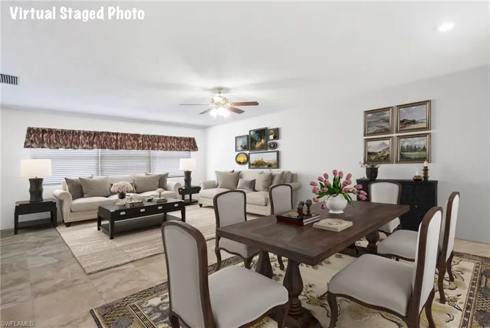 Dining room featuring ceiling fan