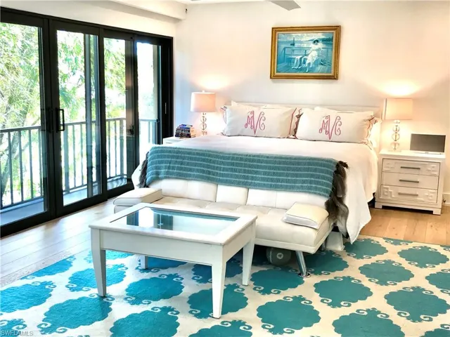 Bedroom featuring light wood-style floors and access to outside