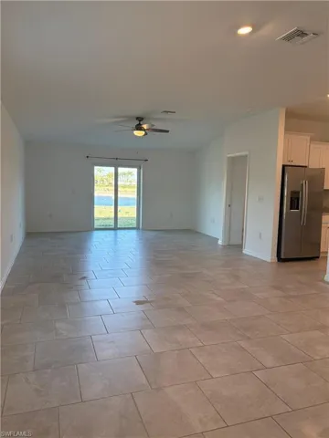 Unfurnished room featuring ceiling fan and recessed lighting